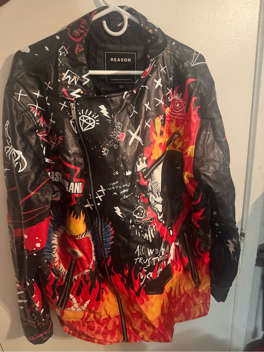 Reason Men’s Black Leather Jacket with Red & Yellow Flame Graphics